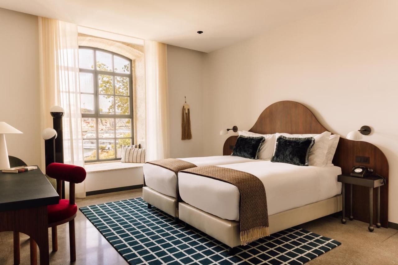The Rebello Hotel & Spa - Small Luxury Hotels Of The World Vila Nova de Gaia Dış mekan fotoğraf A guest room at the Hotel 57